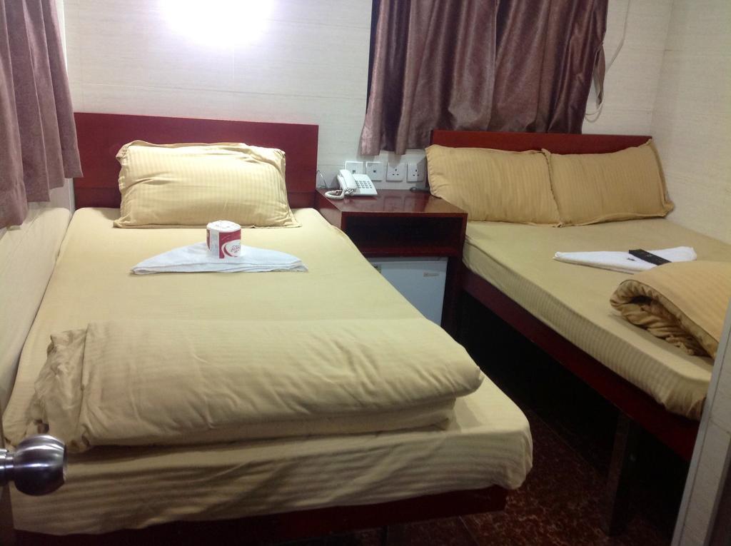 New Yan Yan Guest House Reception 9Th Floor Flat E4 E6 Hong Kong Luaran gambar
