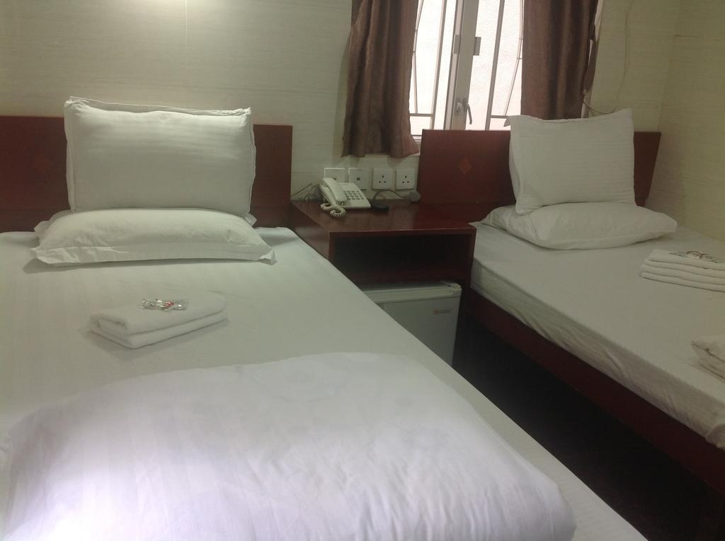 New Yan Yan Guest House Reception 9Th Floor Flat E4 E6 Hong Kong Luaran gambar